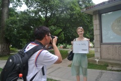 Chinese students photographing Lea and her wish